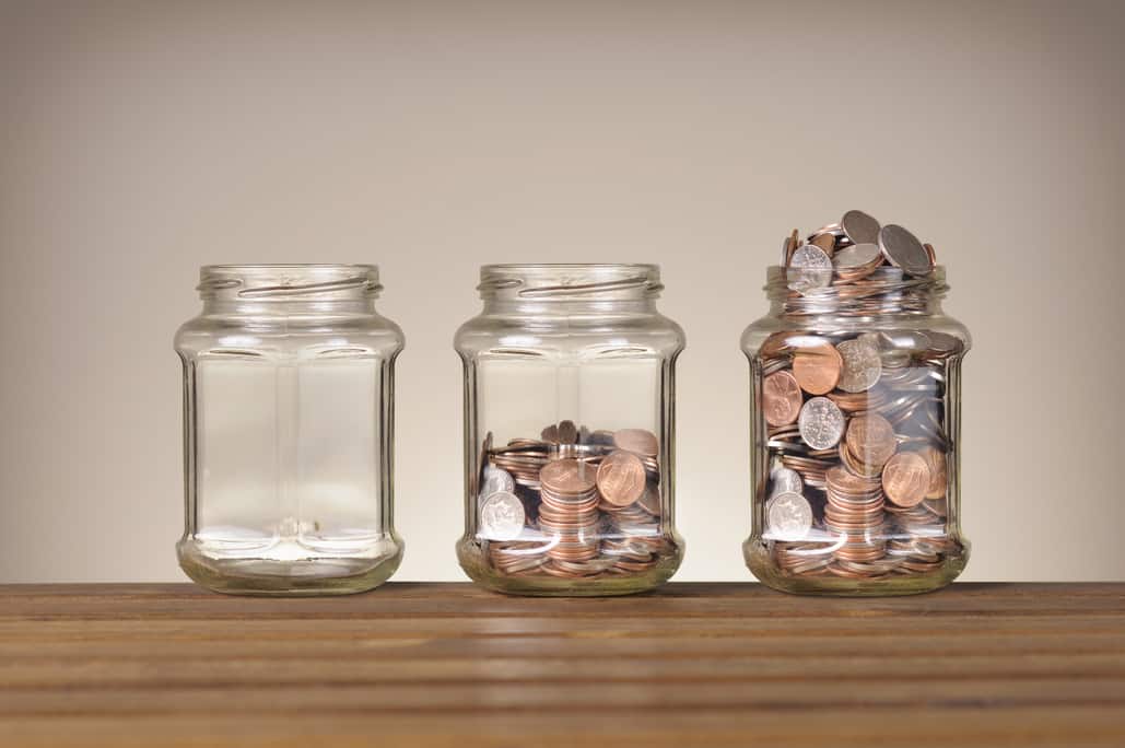 Annuities vs Mutual Funds - Jars with various amounts of change